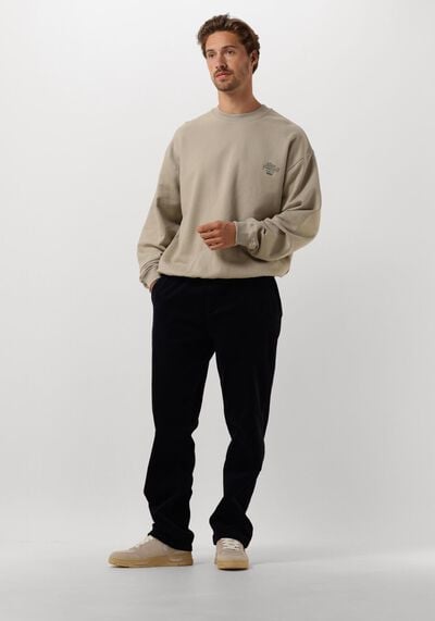 Hoe combineer ik een oversized sweater