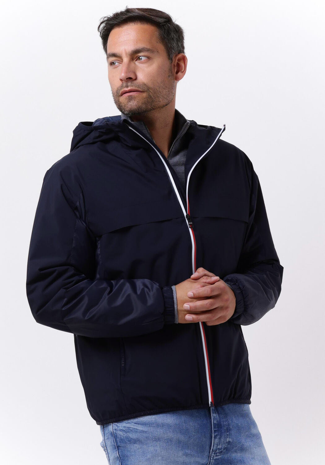 Tommy regenjas discount