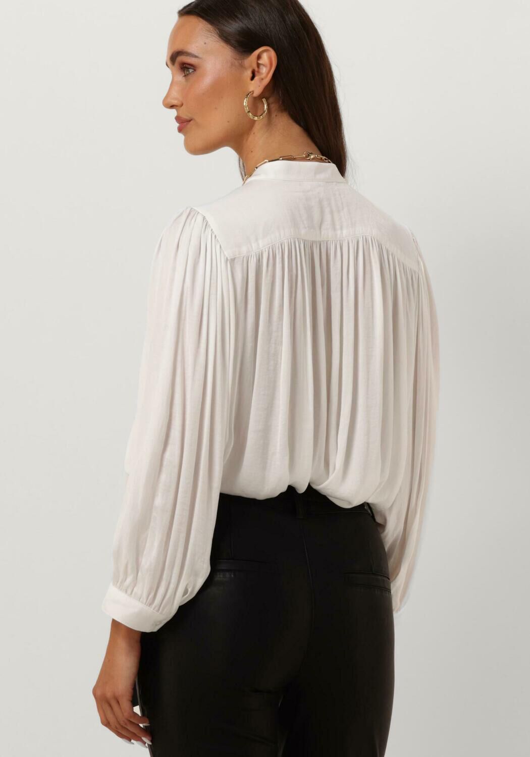 Knitted blouse shop