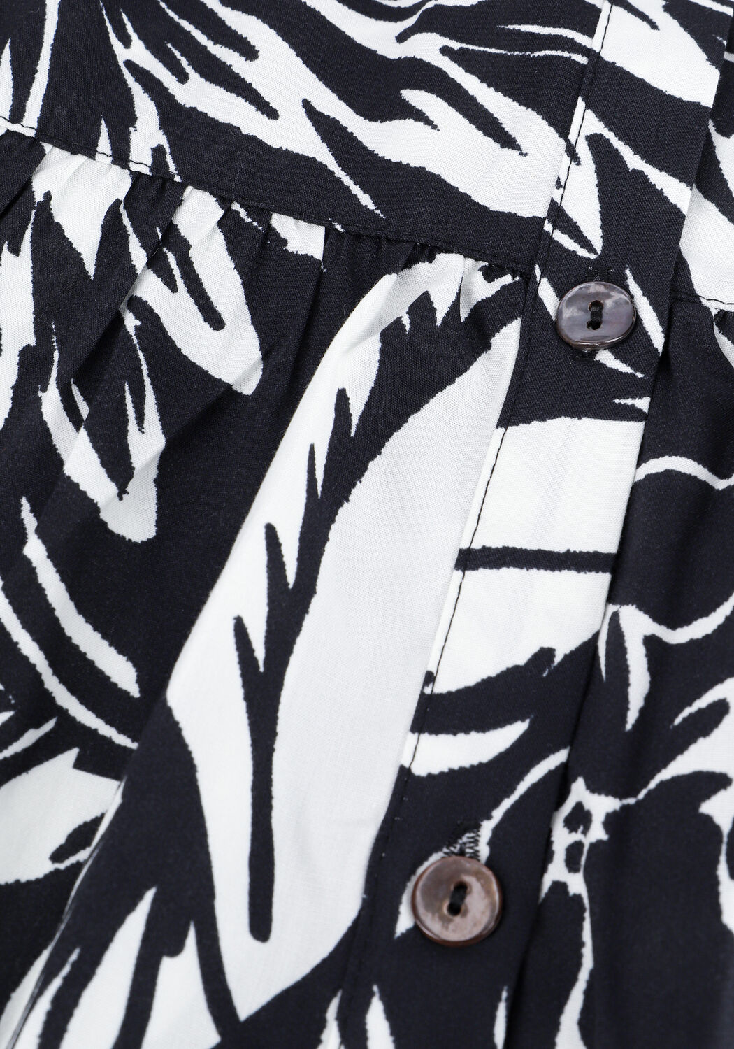 Zwarte jurk online met witte bloemen