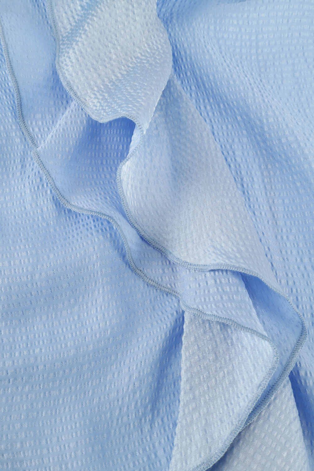 Lichtblauwe VANILIA Blouse STRUCTURE RUFFLE TOP | Omoda