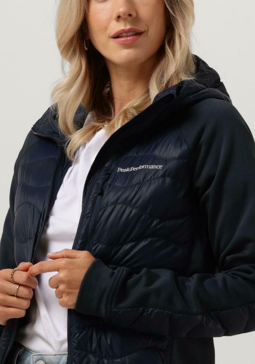 Donkerblauwe PEAK PERFORMANCE Jack M HELIUM DOWN HYBRID HOOD Omoda