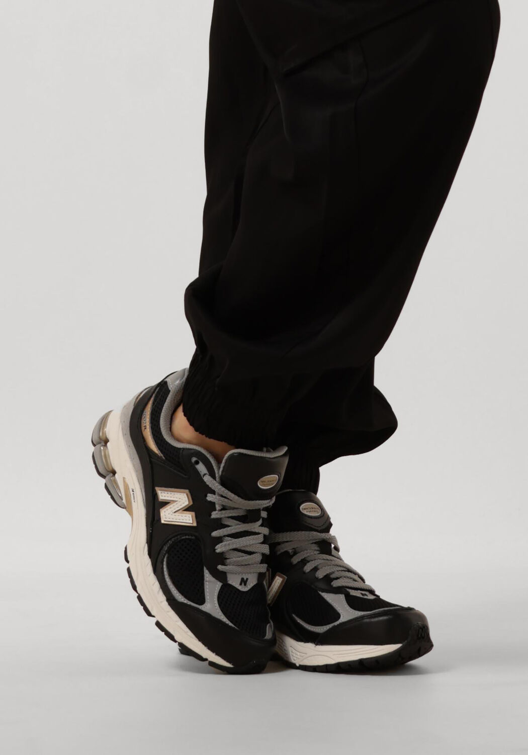 New balance zwart dames sale sales