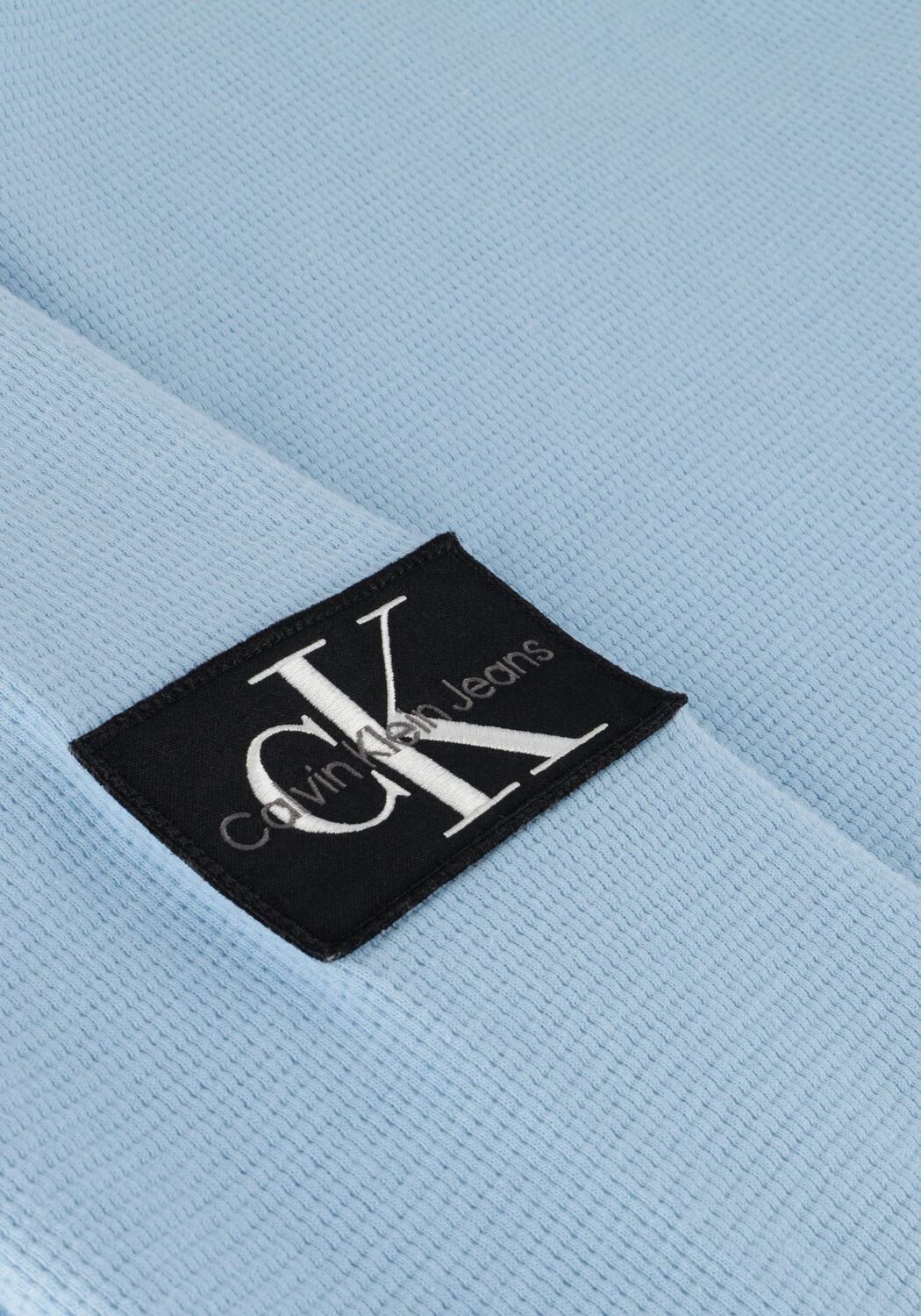 Lichtblauwe CALVIN KLEIN Trui BADGE WAFFLE LS TEE - large