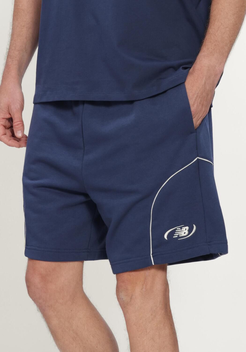 Donkerblauwe NEW BALANCE Korte broek TRACKSIDE FRENCH TERRY SHORT 7 - large