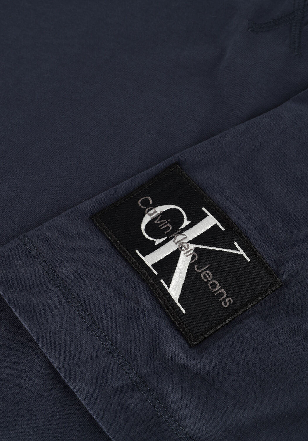 Donkerblauwe CALVIN KLEIN T-shirt BADGE REGULAR TEE - large