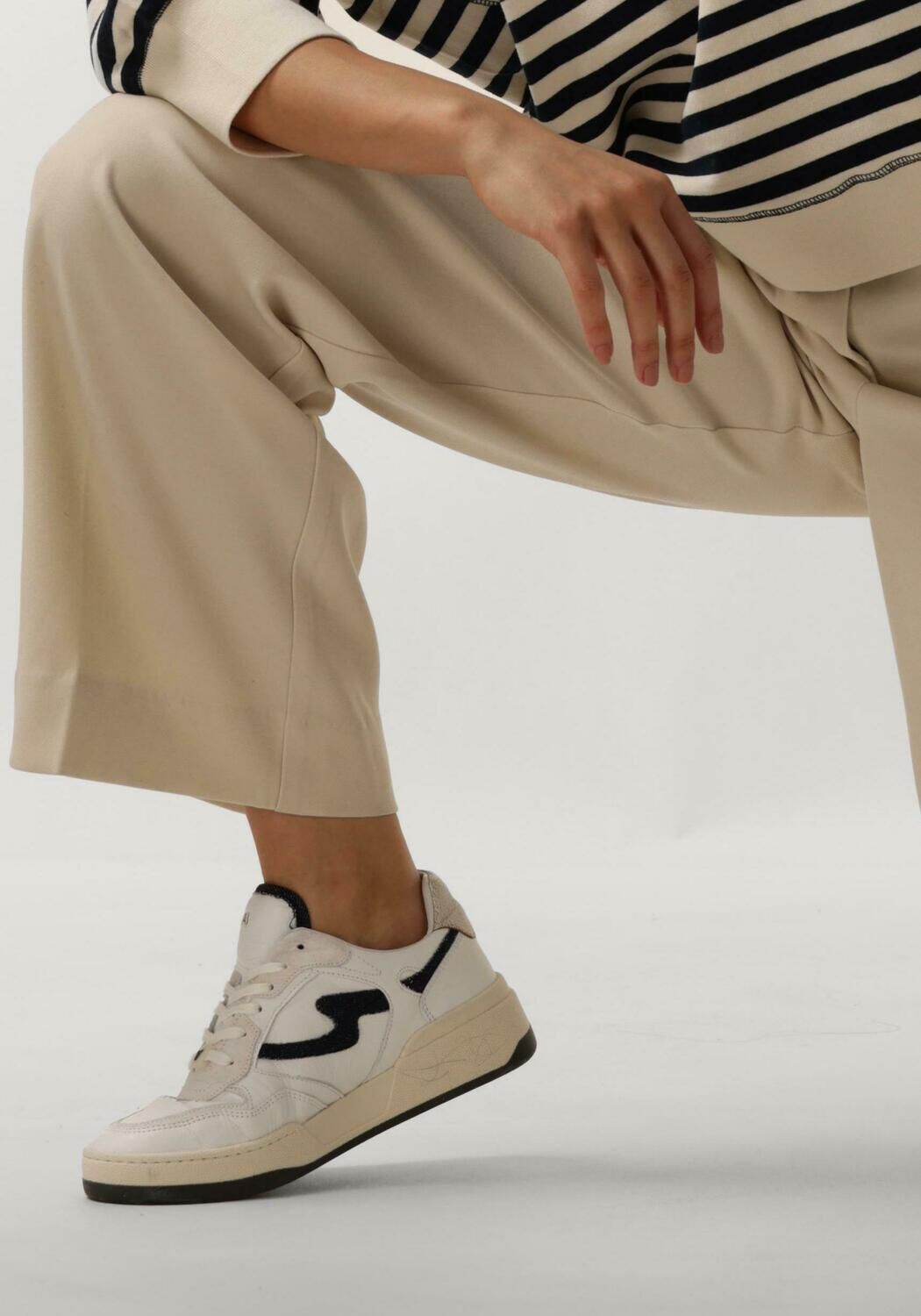 Sneakers volgende dag in huis 2025
