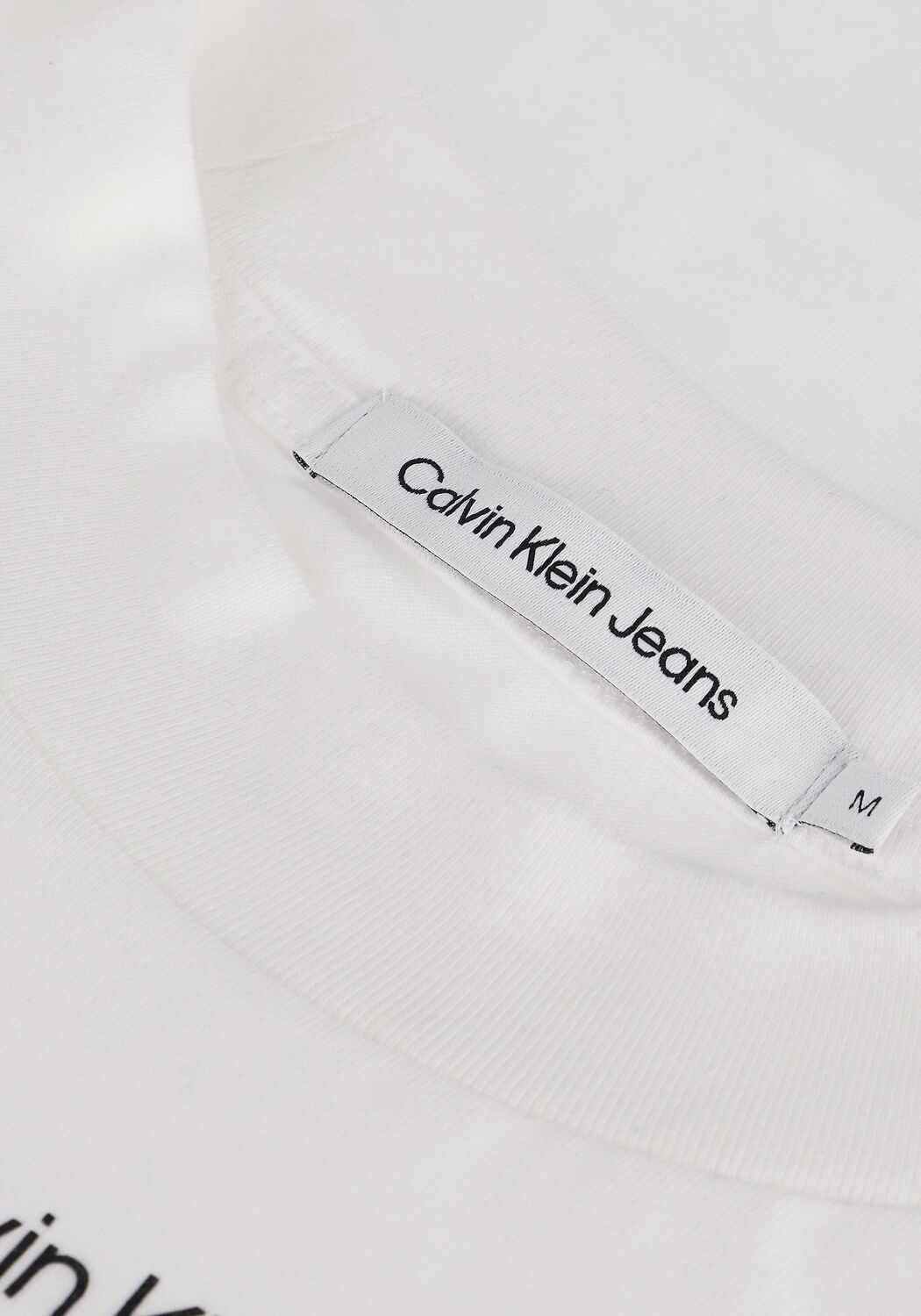 Witte CALVIN KLEIN T-shirt STACKED LOGO LOOSE TEE - large