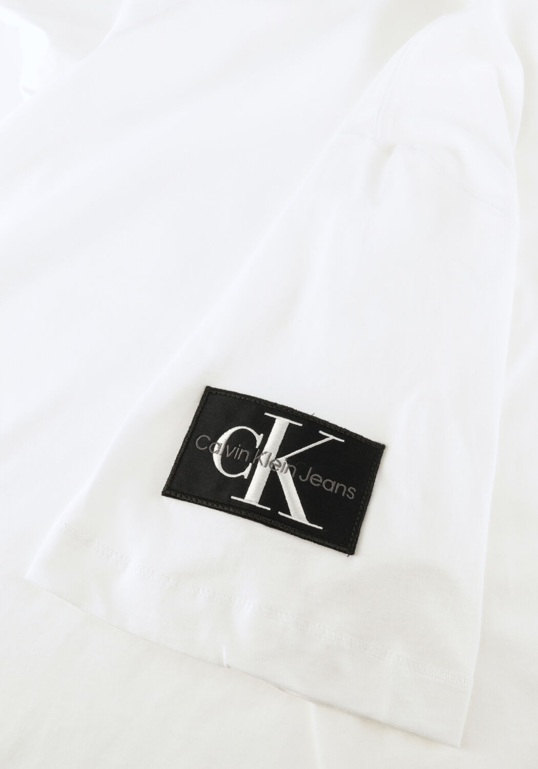 Witte CALVIN KLEIN T-shirt BADGE REGULAR TEE - large