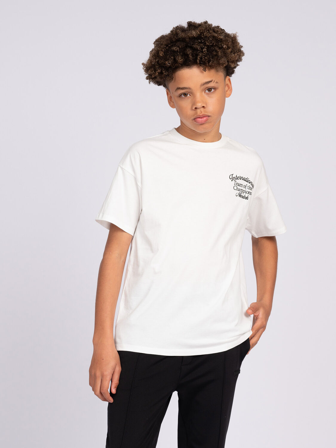 NIK & NIK Jongens Polo's & T-shirts Champion T-shirt Wit