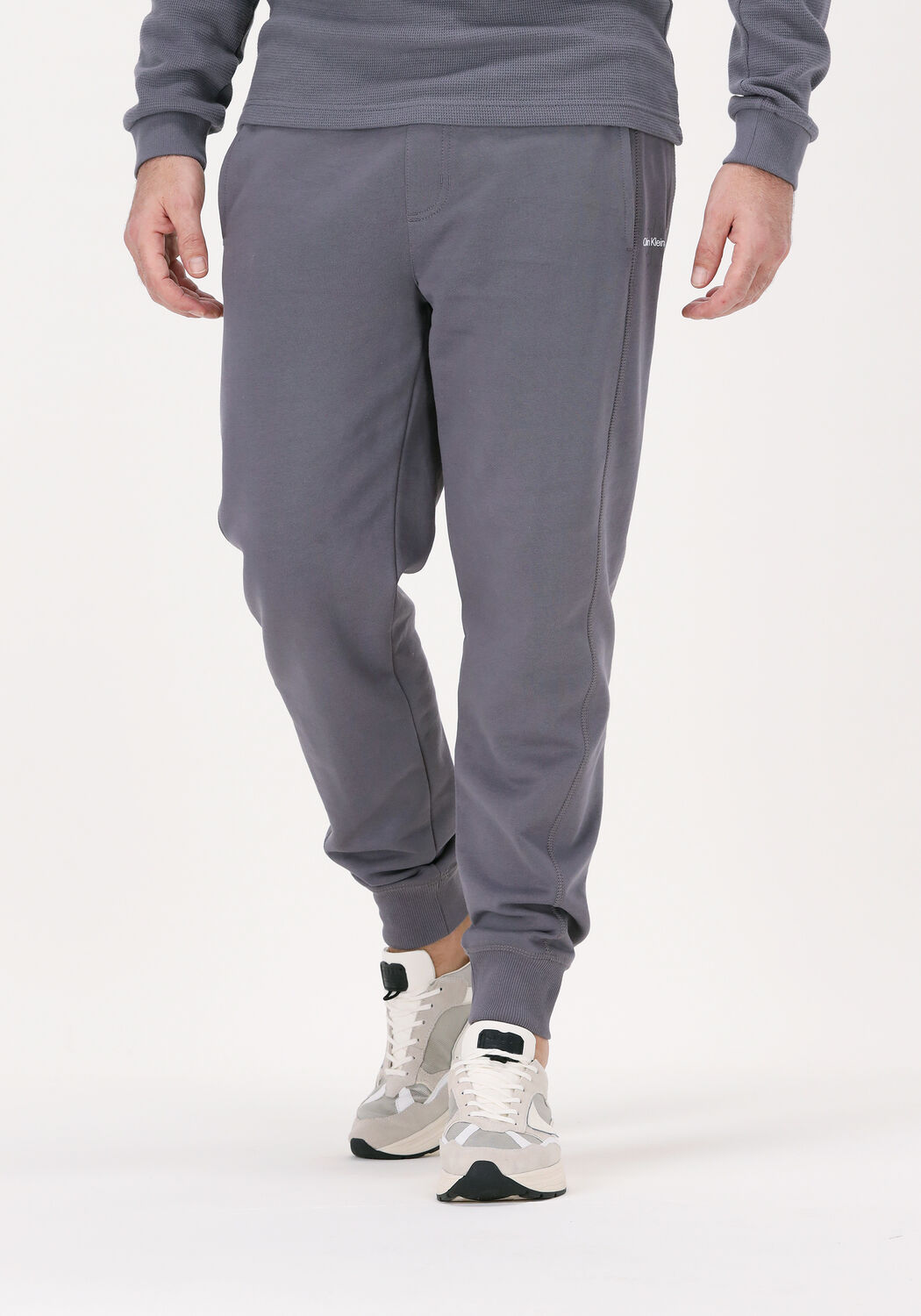 Calvin klein sweatpants with hot sale logo