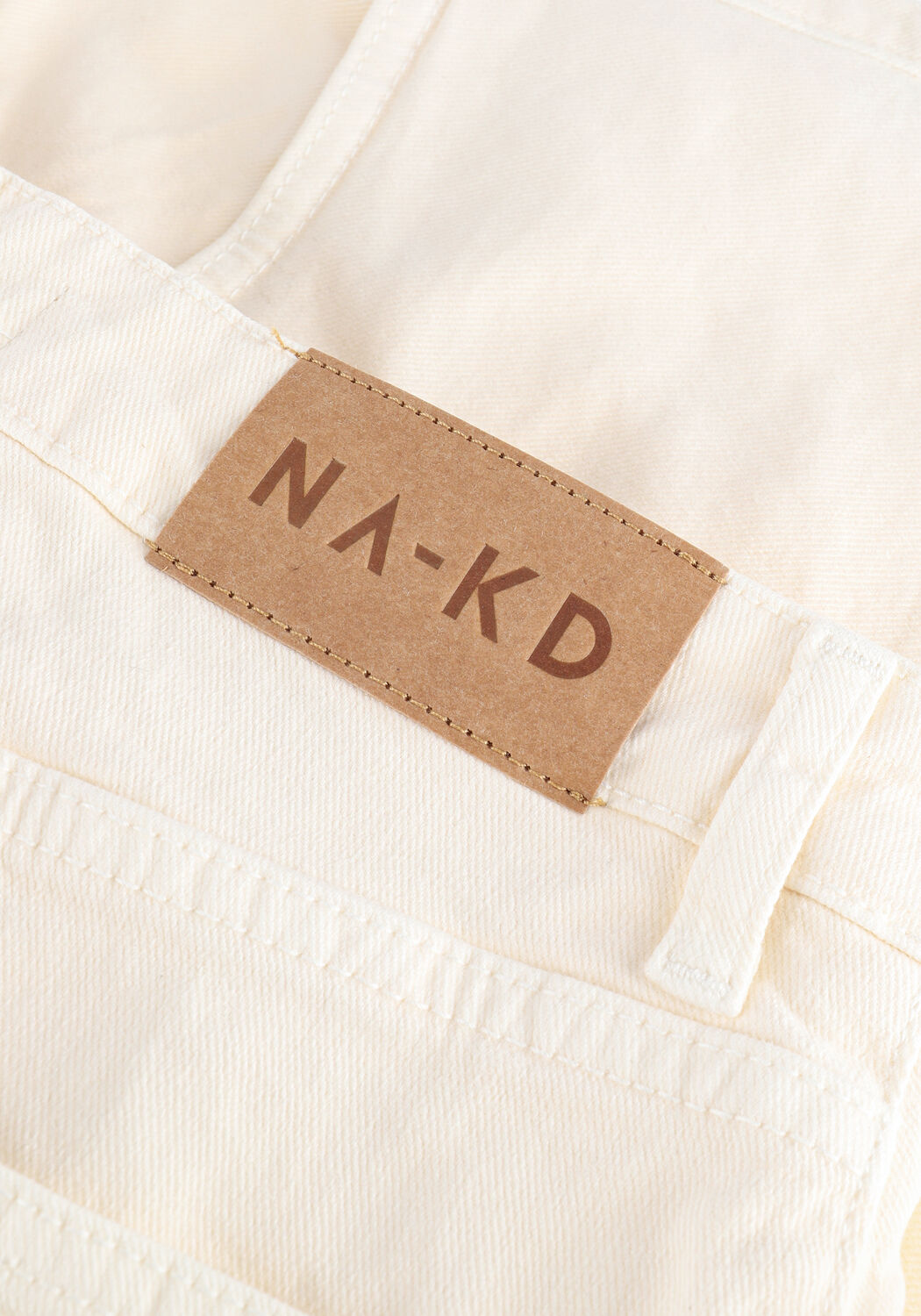 Creme NA-KD Jeans RAW HEM SLIT DENIM SHORTS - large