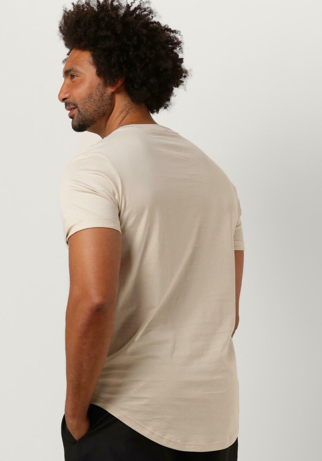 beige calvin klein t shirt badge turn up sleeve