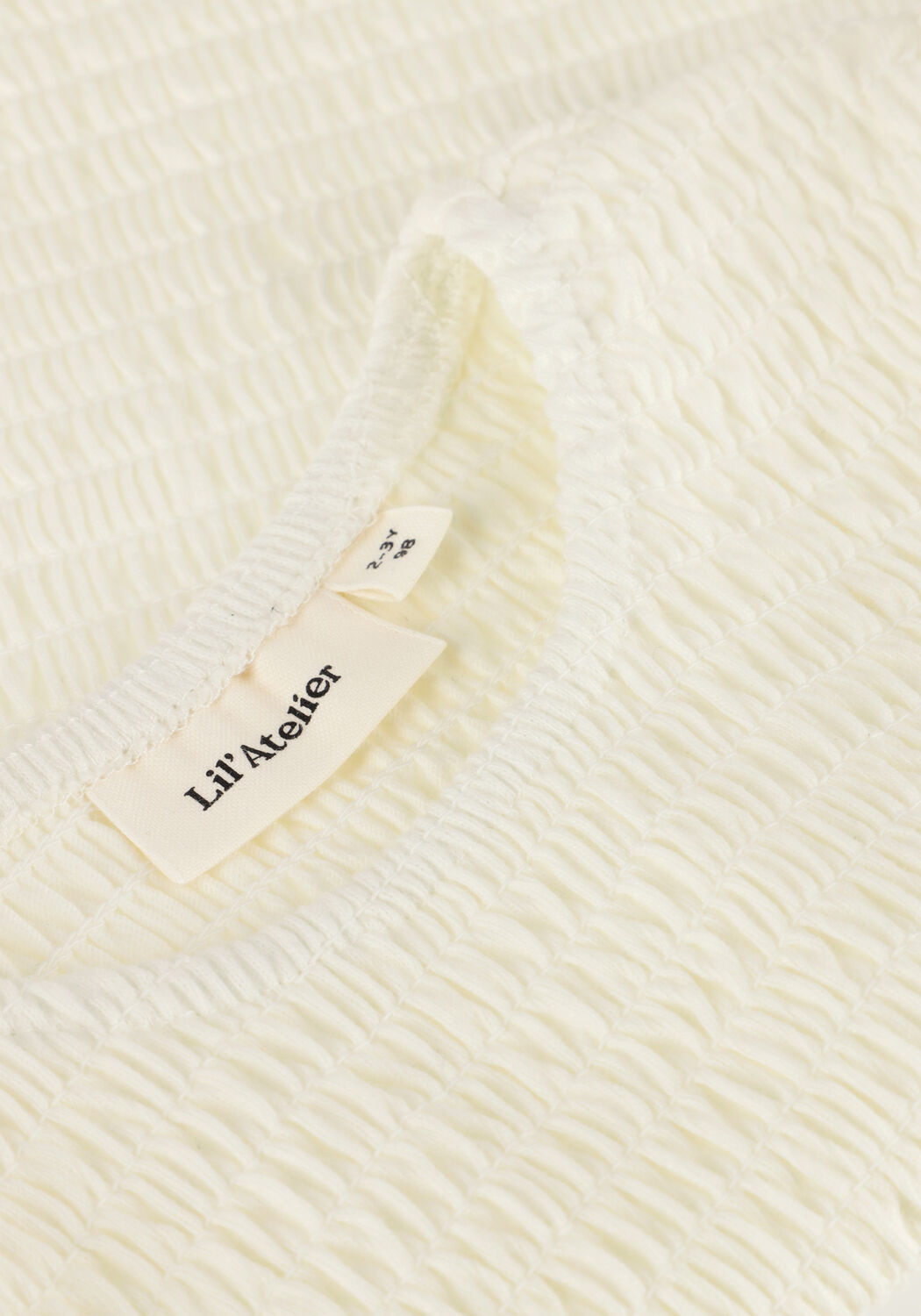 Witte LIL' ATELIER T-shirt NMFJACOBA SS SHORT SLIM TOP LIL - large