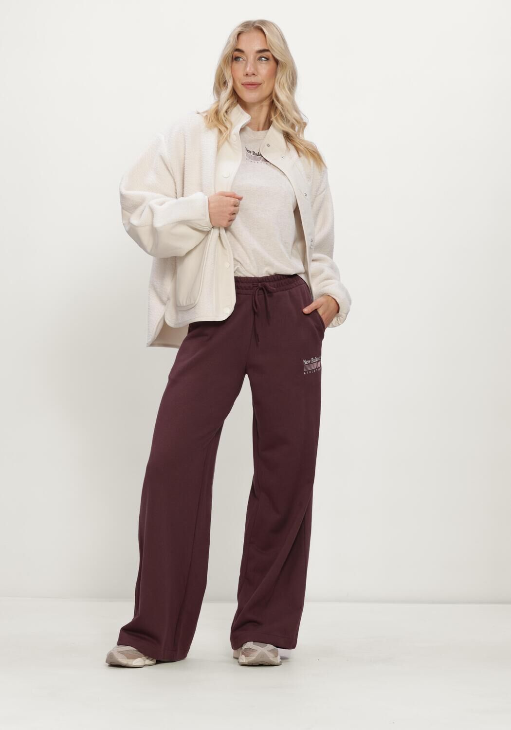 NEW BALANCE Dames Broeken Trackside French Terry Pant Bordeaux