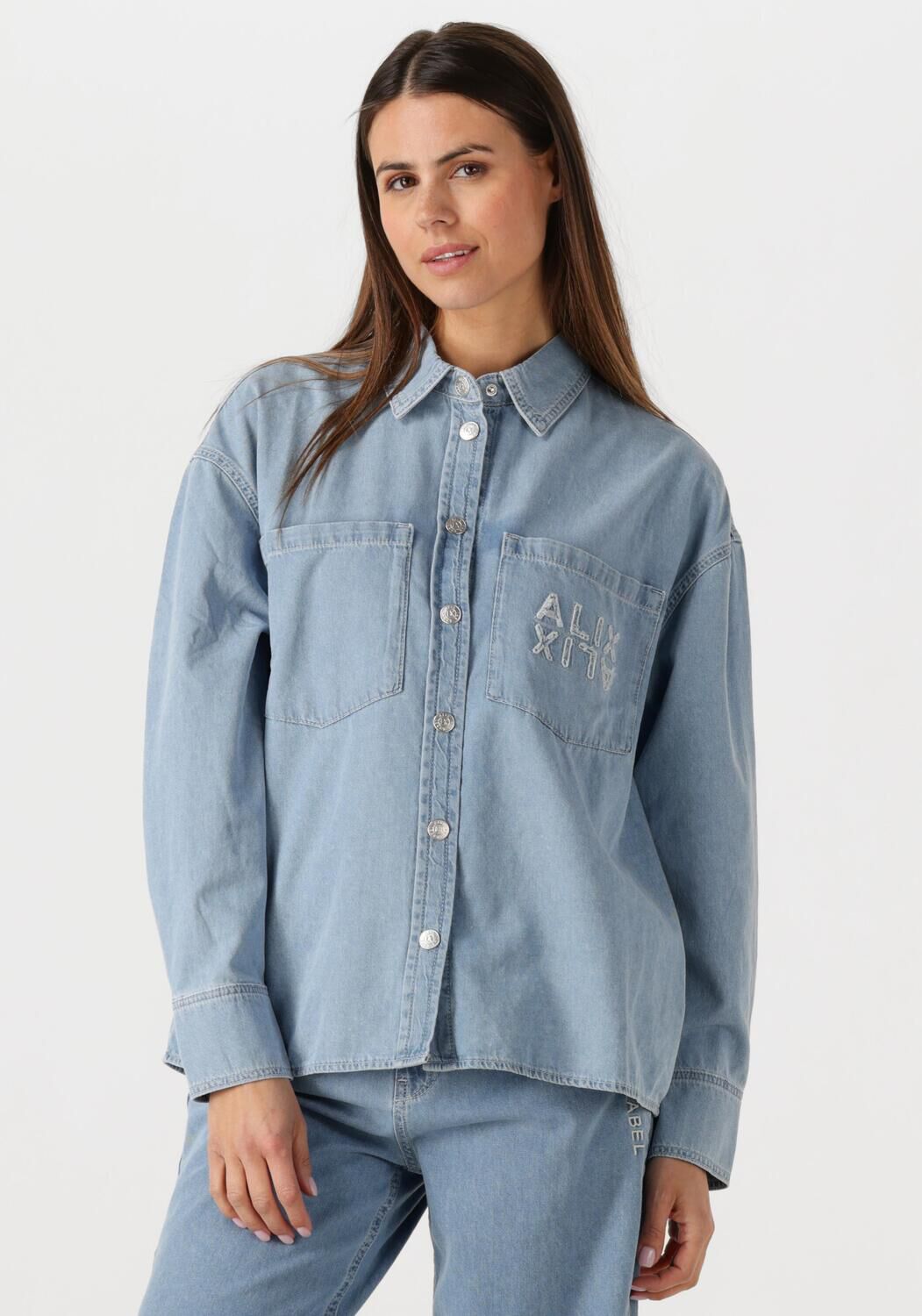 ALIX THE LABEL Dames Blouses Ladies Woven Chambray Peplum Denim Blouse Blauw