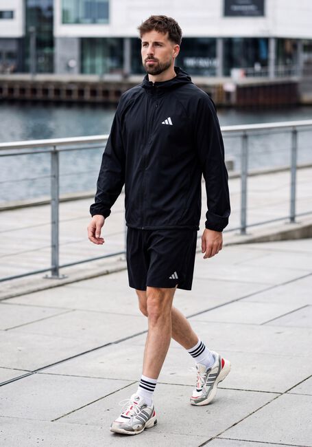 Zwarte ADIDAS Jack RUN ESS JKT M - large