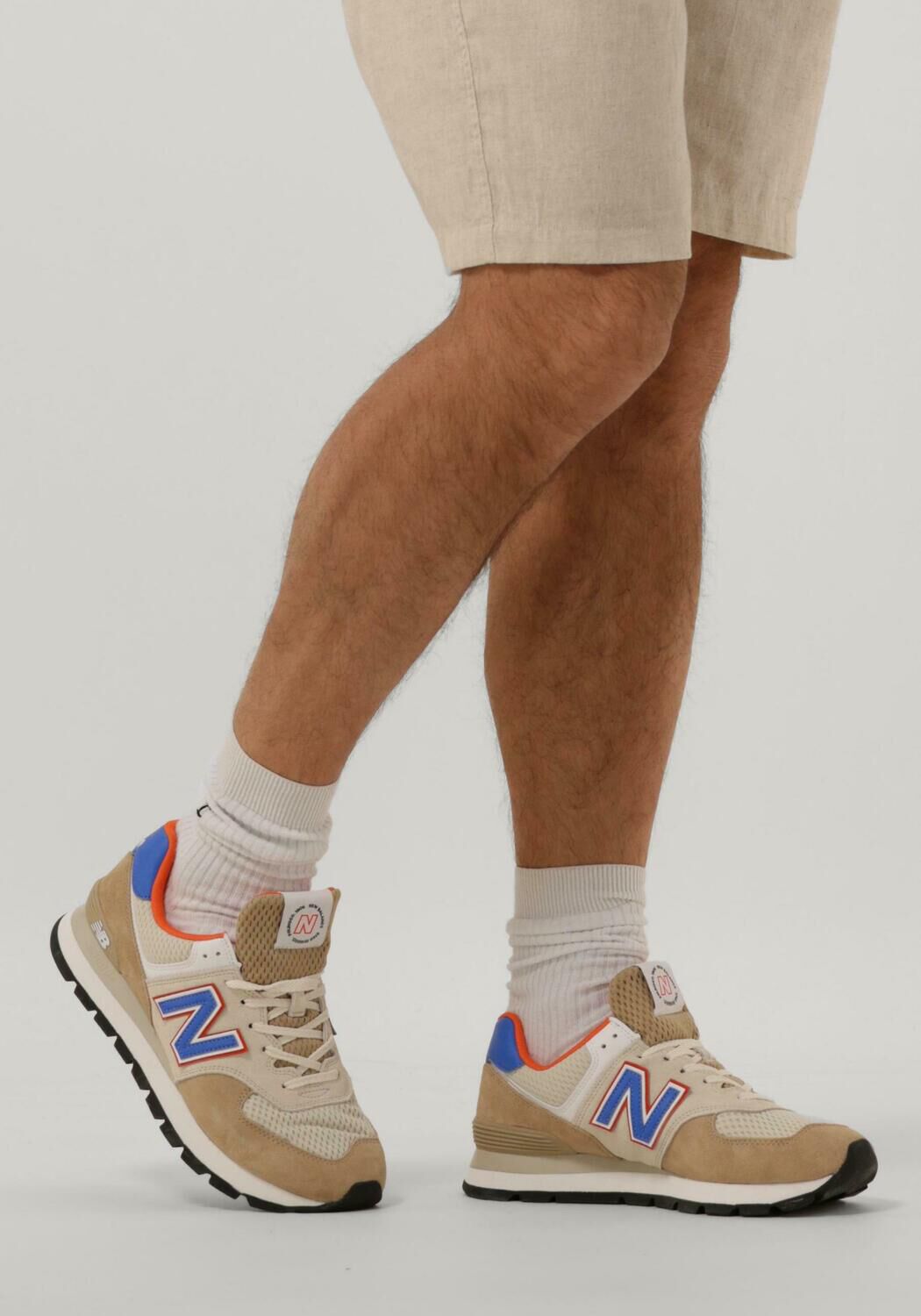 beige new balance lage sneakers ml574