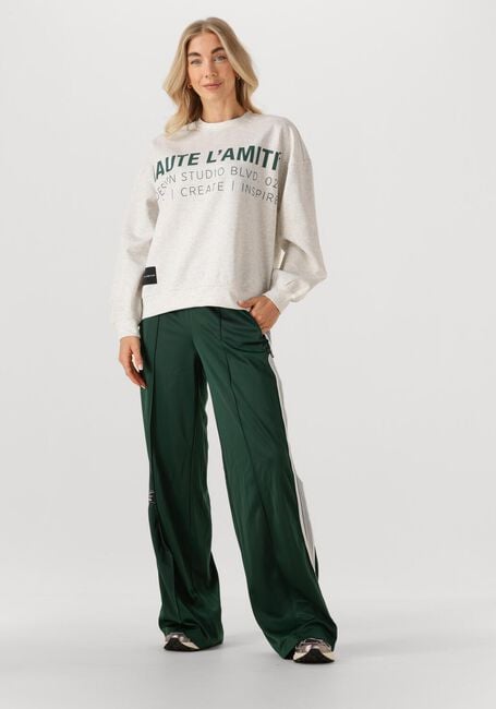 Donkergroene HAUTE L'AMITIÉ Wijde broek BAGGY TRACK TALL PANTS - large