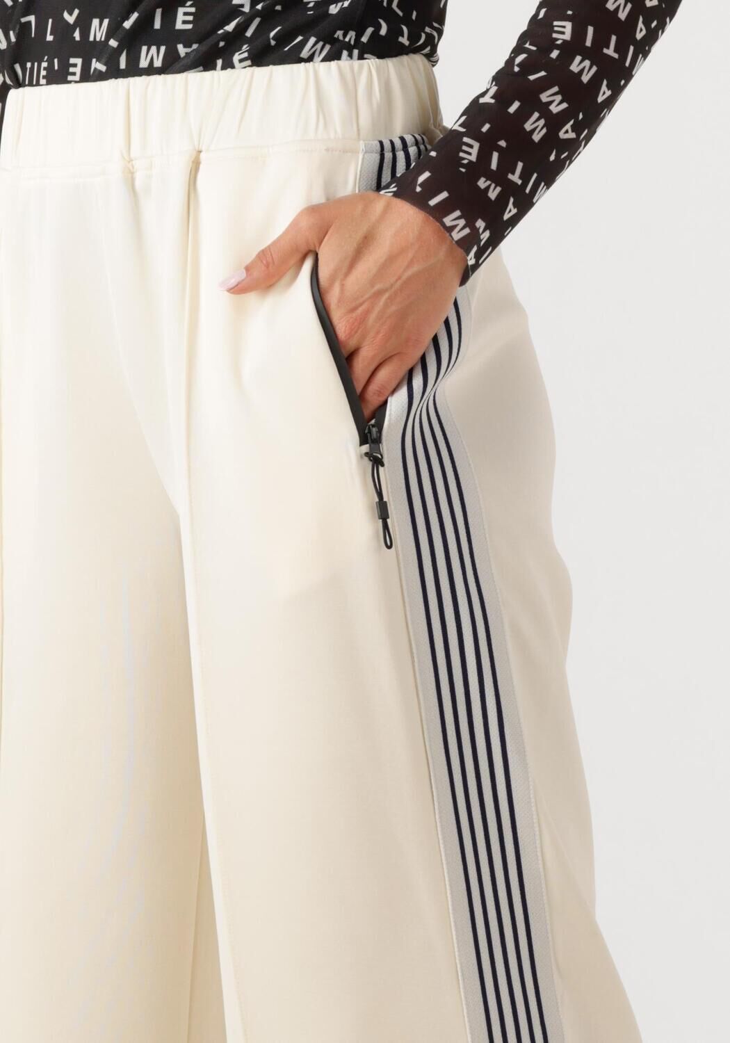 HAUTE L'AMITIÉ Dames Broeken Baggy Track Tall Pants Wit