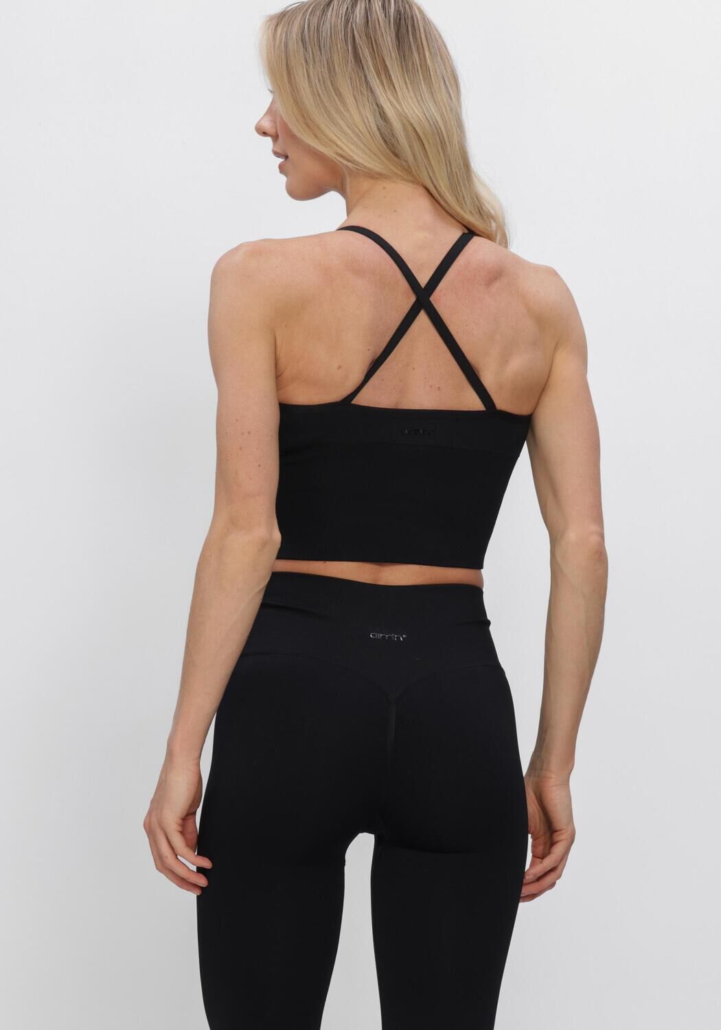 Zwarte AIM'N Sporttops SHAPE SEAMLESS CROSS BACK BRALETTE - large