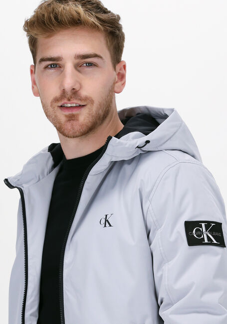 Grijze CALVIN KLEIN Gewatteerde jas HOODED PADDED HARRINGTON JACKE - large